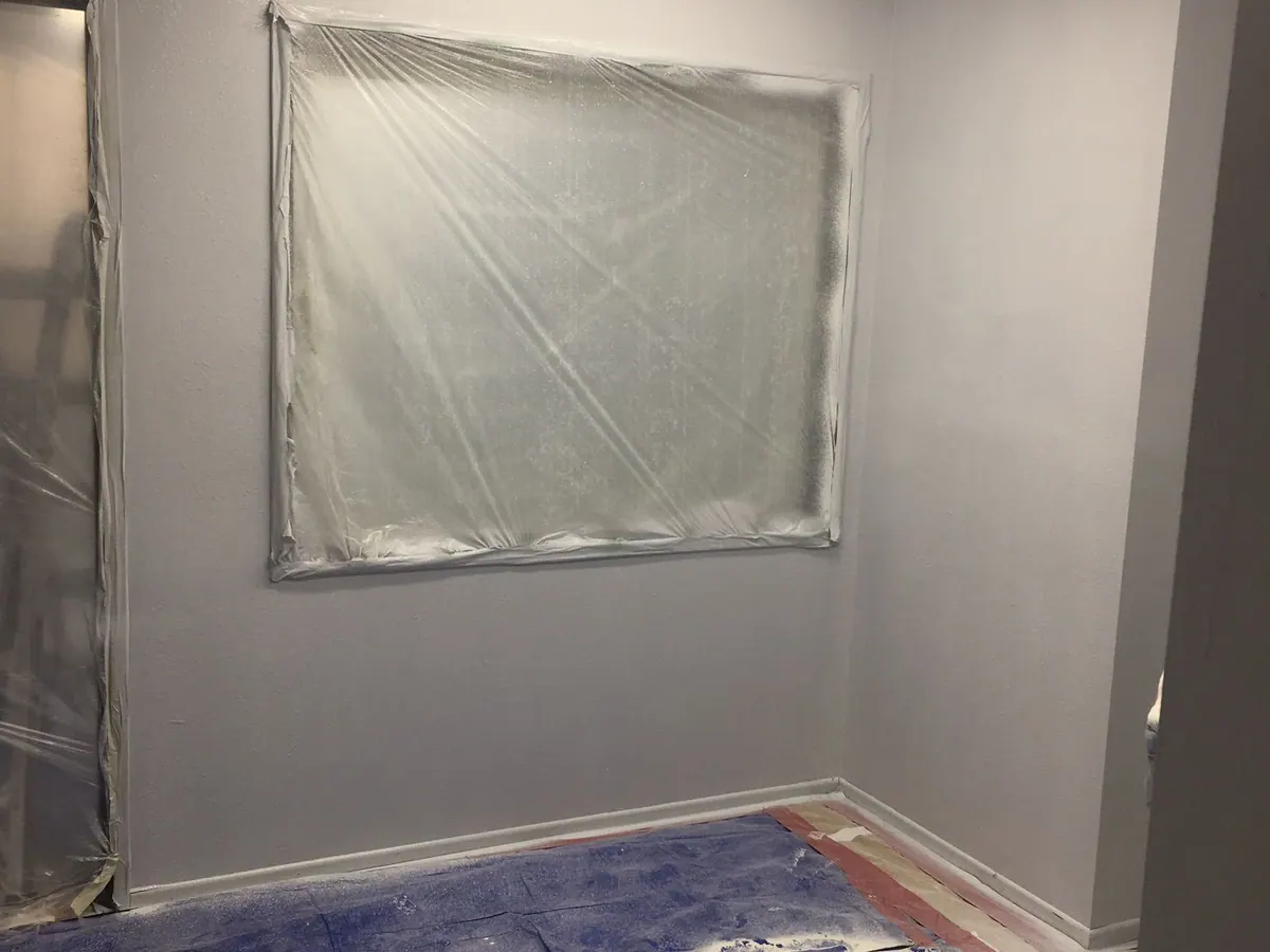 Plastic containment sealing a doorway before interior demolition