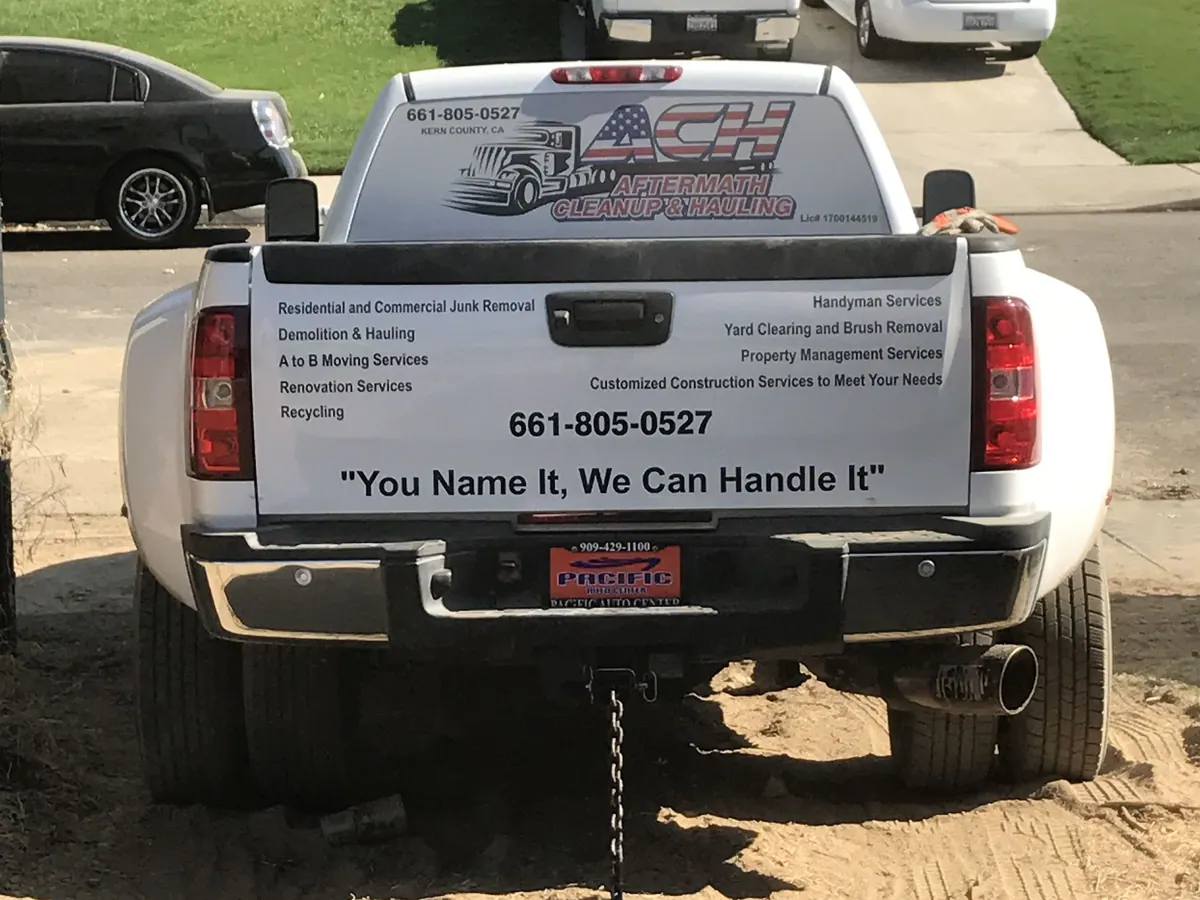 Aftermath Cleanup & Hauling company truck on a Bakersfield job site